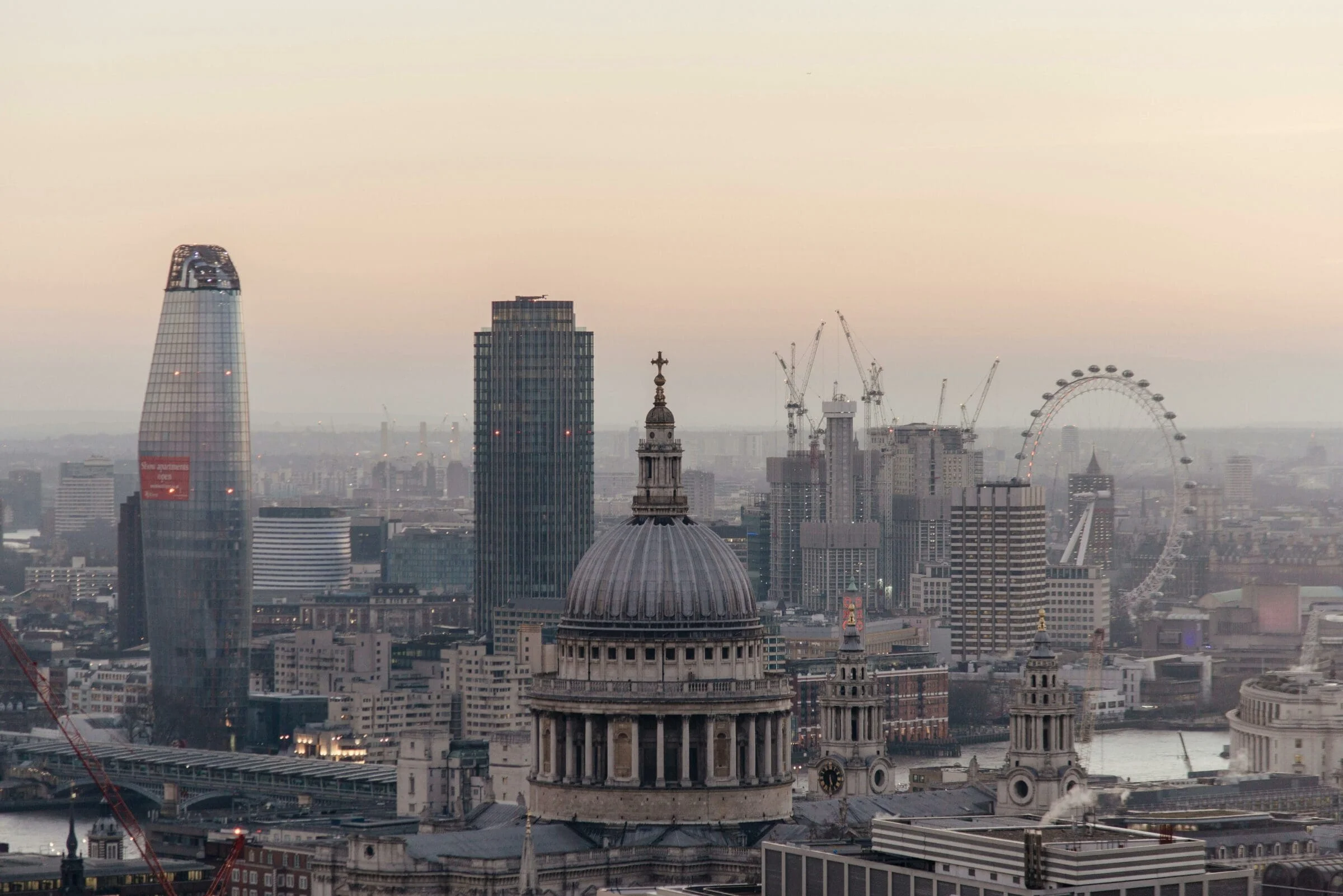 View of The City at dusk, private law firm offering services in Islington, Hampstead and Westminster.  