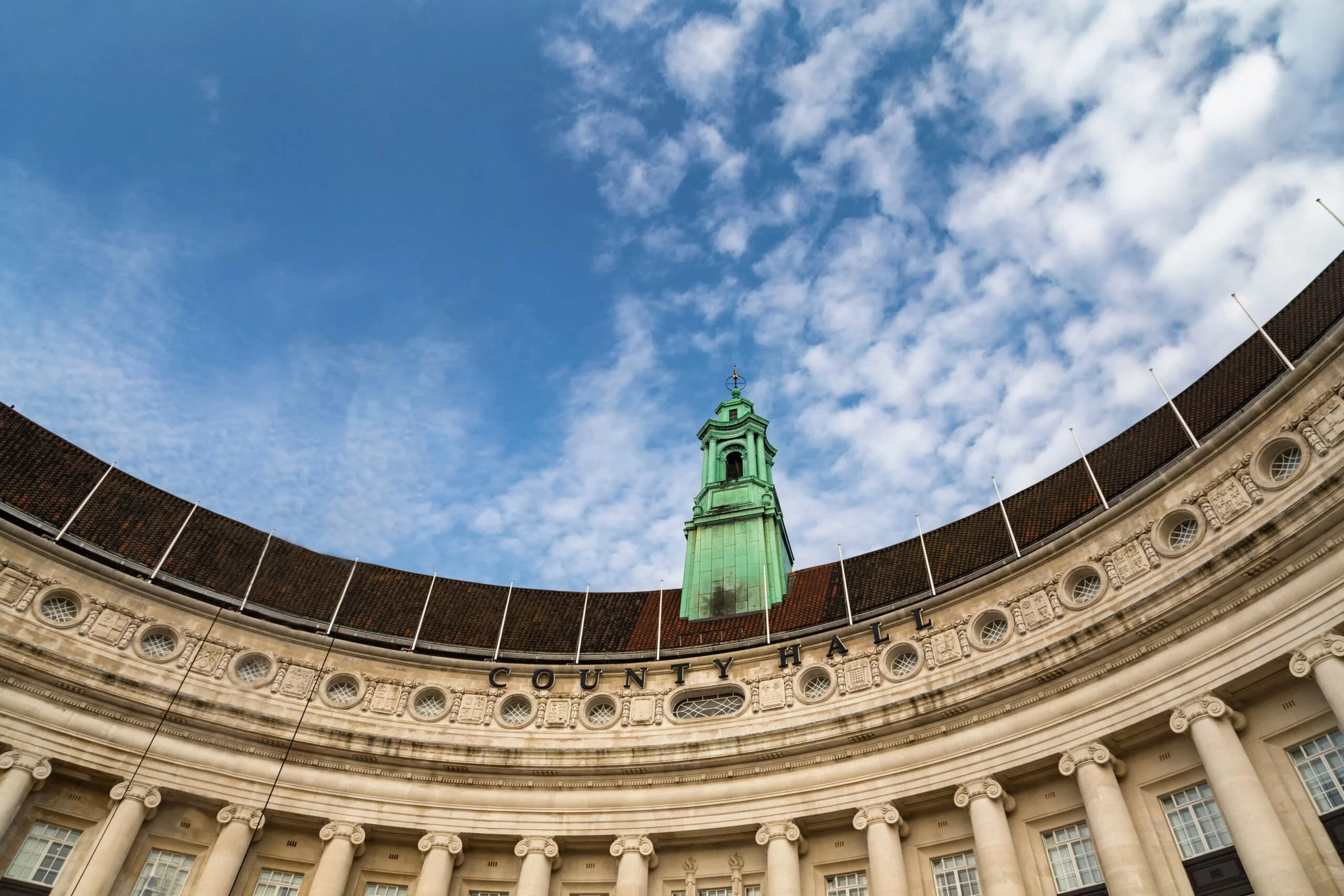 Wide angle view of County Hall in London, offering legal services for bespoke wills in London.
