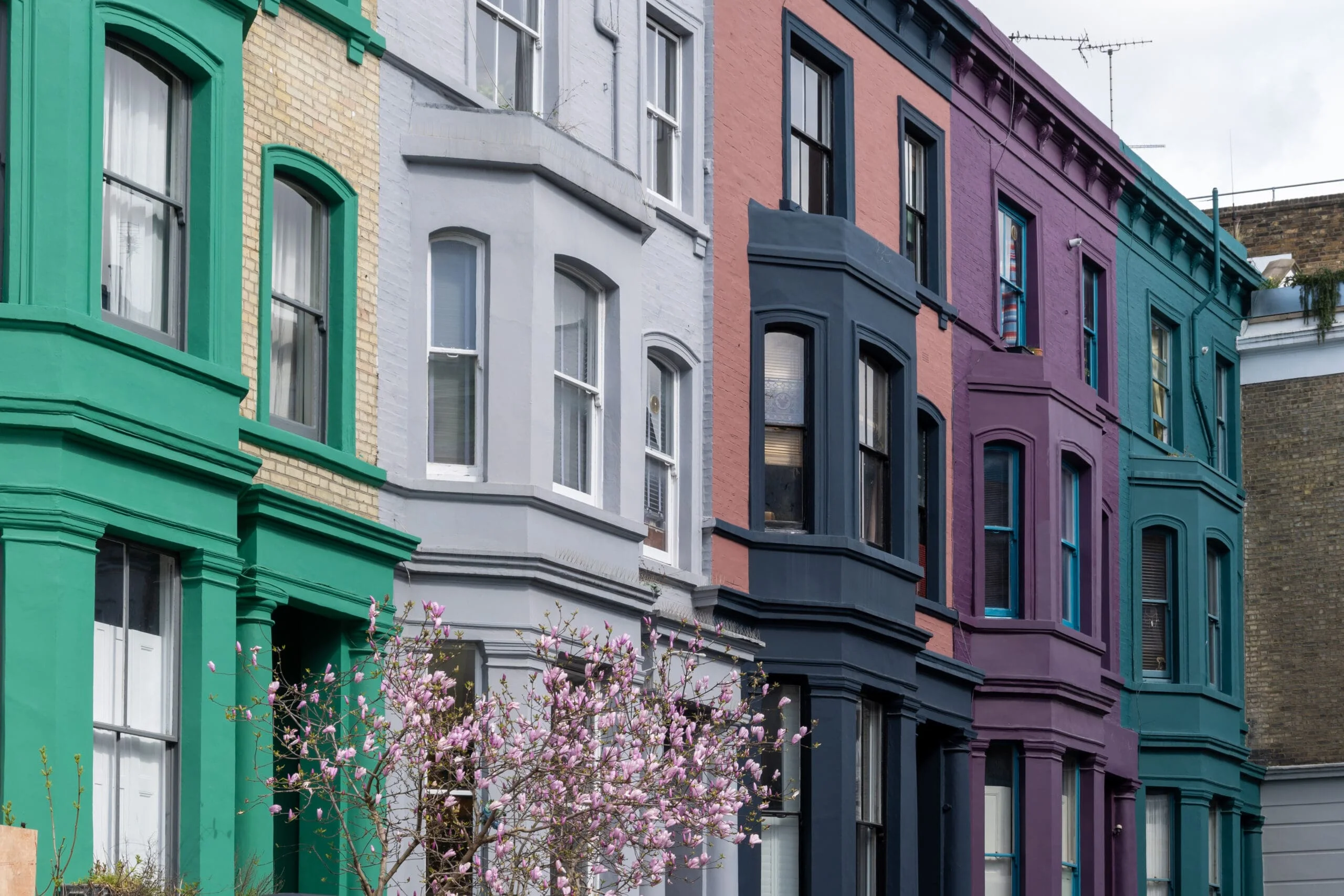 Touristic route on Notting Hill, walking on streets with colourful houses, Portobello road, city life, wealthy neighbourhoods in London, UK in spring. Private Client Law Services in London, Notting Hill